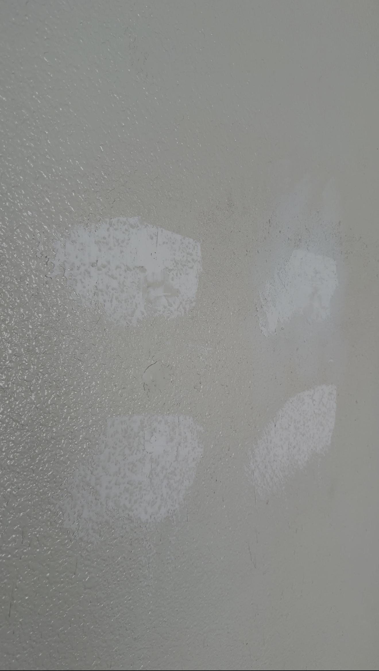 Patches on an interior wall being prepared for painting in the Bakersfield rental